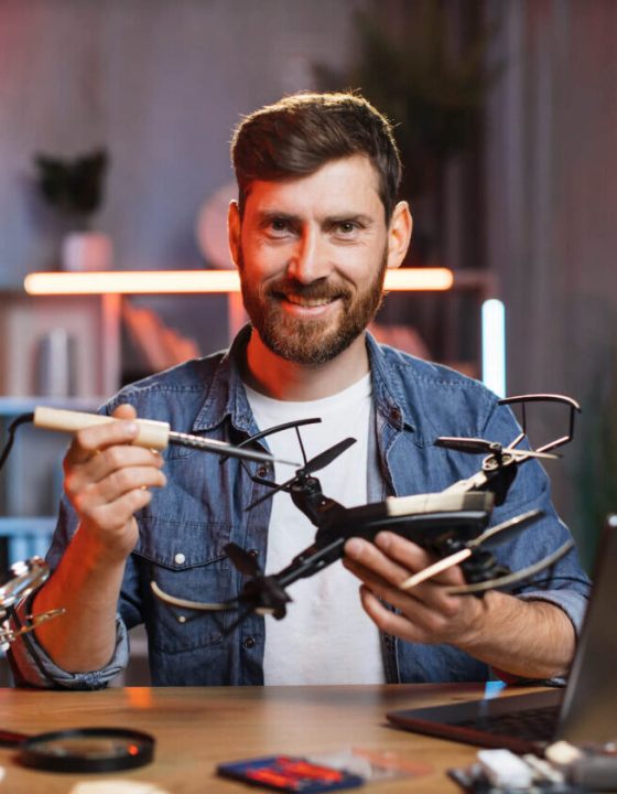happy-smiling-caucasian-man-using-soldering-iron-f-2021-09-04-08-13-33-utc