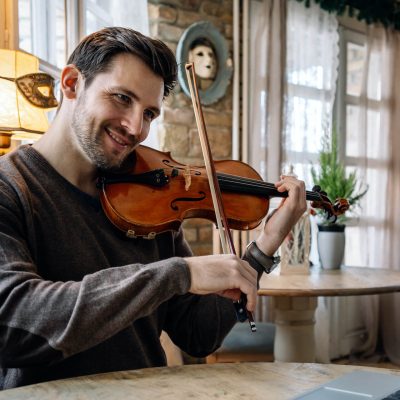man-student-learns-to-play-the-violin-online-using-2021-09-04-04-52-37-utc