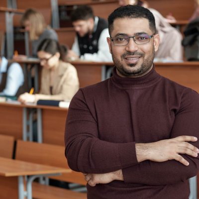 successful-teacher-of-university-looking-at-you-2021-09-24-03-44-22-utc